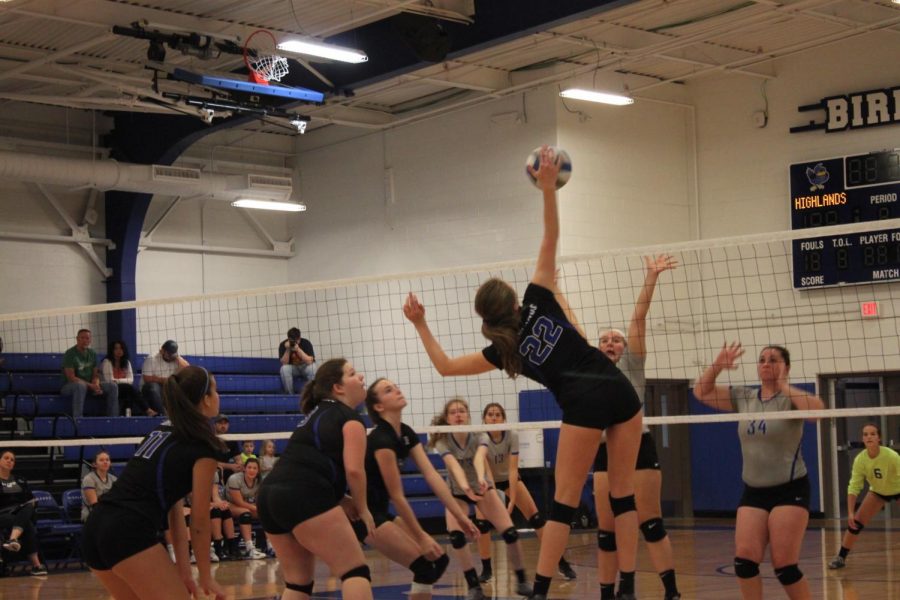 Sophomore Laura Winkler on September 6th, spikes the ball to Walton Veronas side and scores a point with a kill.