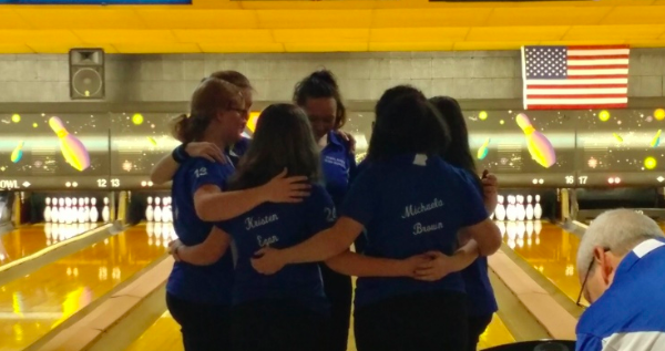 Girls huddle up before the match to get ready to play. Photo: Tristin Brubaker