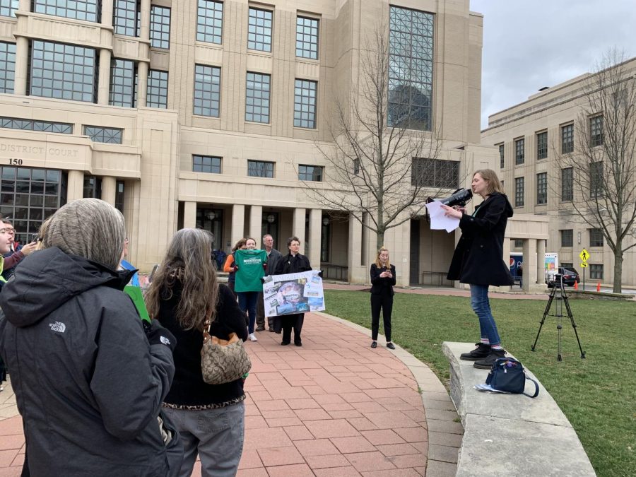 Sophomore Juli Russ delivers a speech at the Climate Change Stike.