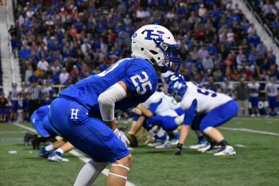 Junior Jason Noe gets into position before the start of a play. 