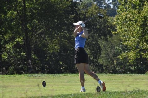 Senior Ellie Rowland takes a swing.