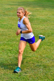 Senior Maggie Schroeder runs in a recent race at Highland Hills Park. 
