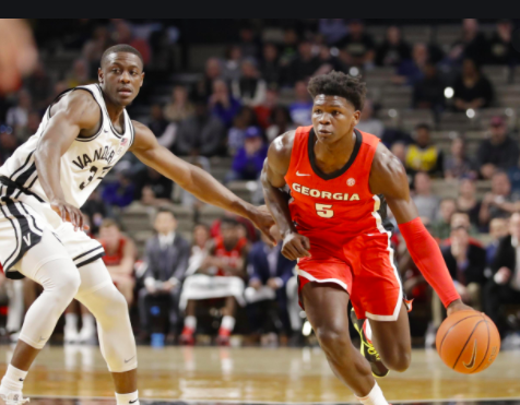 Anthony Edwards runs down the court while being guarded by a Vanderbilt player. (Bleacher Report - https://bleacherreport.com/articles/2905477-projecting-where-anthony-edwards-will-be-selected-after-2020-nba-draft-lottery)