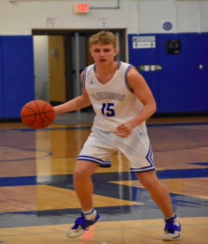 Boys varsity basketball crush St. Henry Crusaders 74-68 in regional semifinals