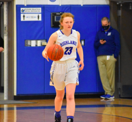 Senior Emma Mallery pauses during a break in the play.