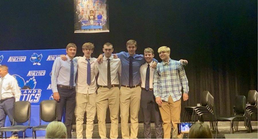 Seniors Austin Duncan, Zachary Barth, Oliver Harris, Cole Kocher, Abe Hils, and Layton Reed model with their championship rings.