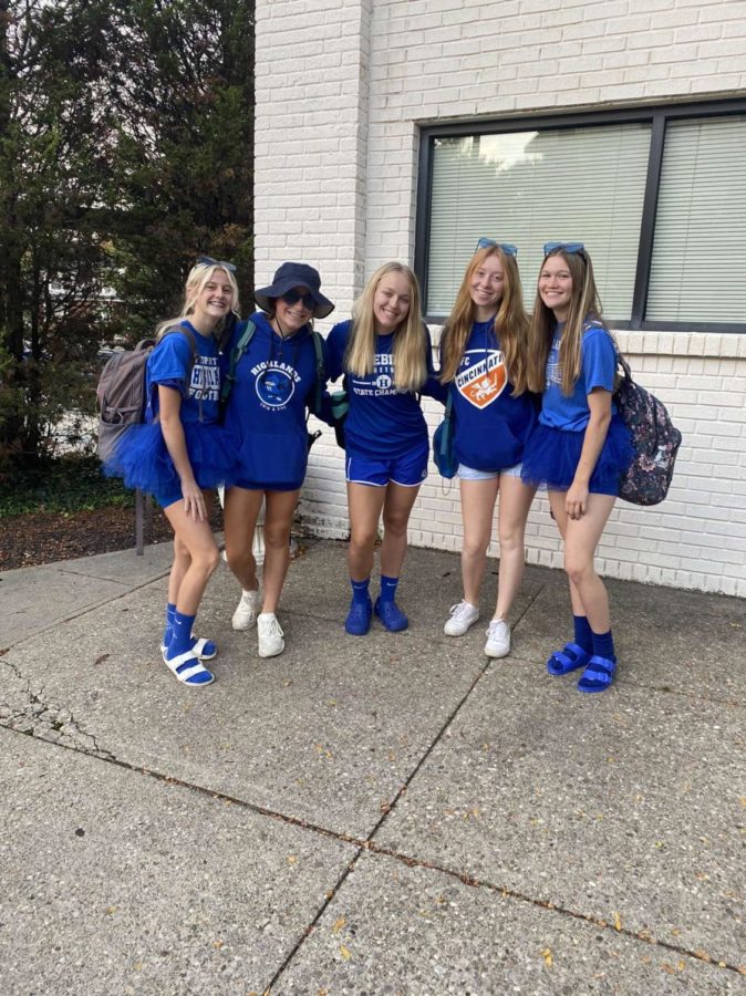 Freshman Ellie Mohr, Sarah Jones, Emme Orme, Adelaide Foley, and Julia Luhn pose together in their Blue Out attire.