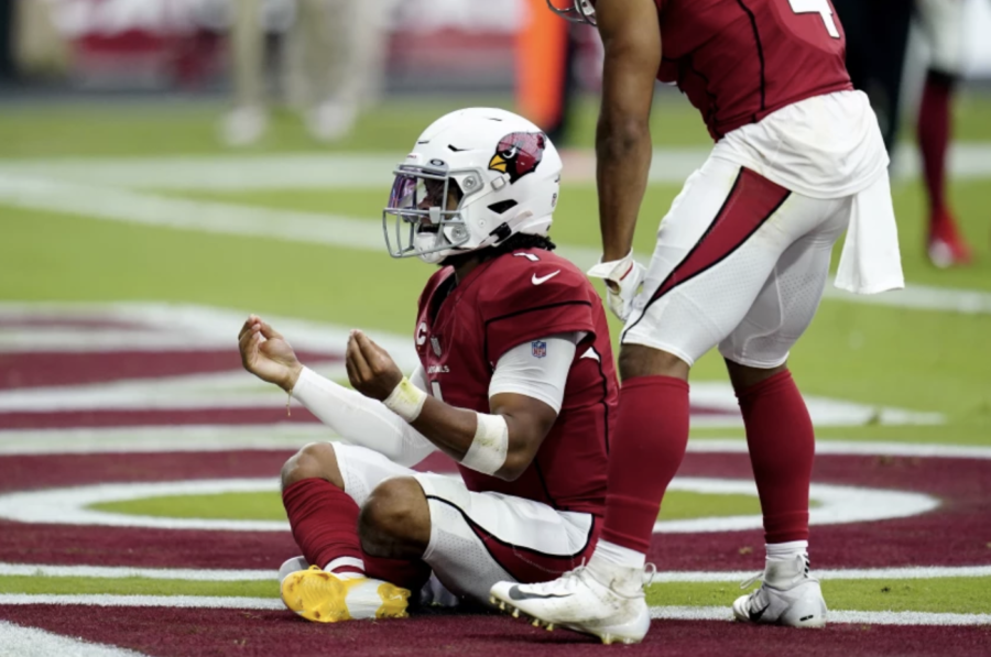 Arizona Cardinals quarterback Kyler Murray celebrates a touchdown that he scored against the Minnesota Vikings during the first half of the  game on Sunday, September 19.