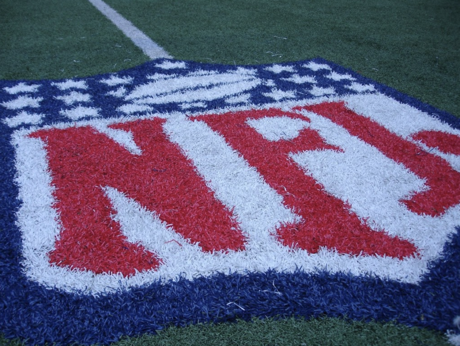 Image+of+the+NFL+logo+on+a+turf+football+field.+