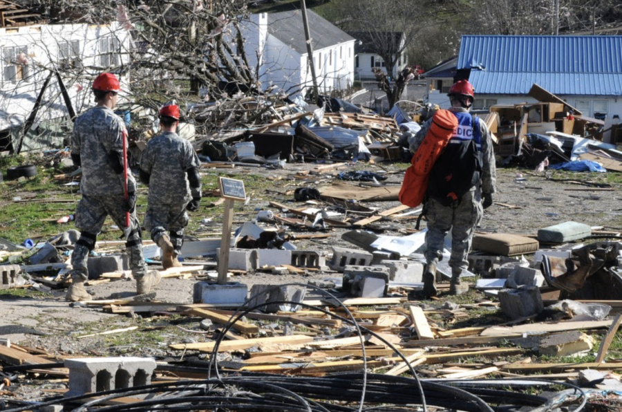 Families+go+through+the+wreckage+after+tornadoes+hit+Western+KY.+