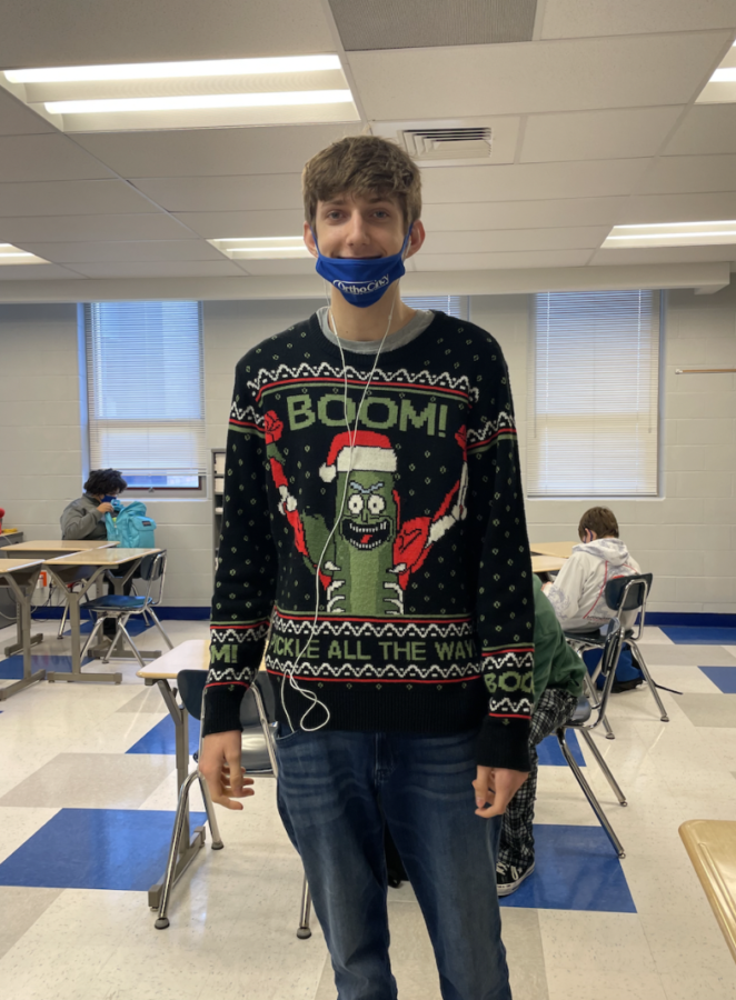 Sophomore Zach Russ shows off his ugly Christmas sweater for the holiday season. 