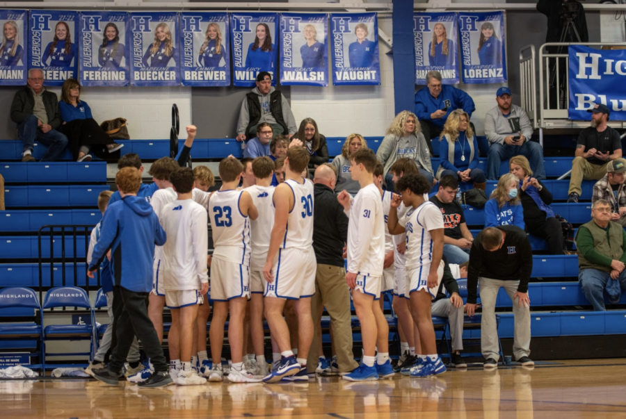 The boys basketball team breaks it down during a time out against Breathitt County.