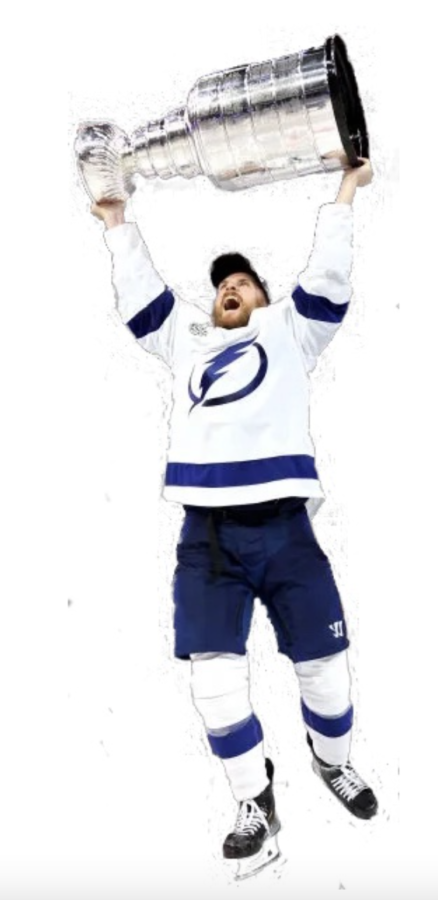After Tampa Bay Lighting won the Stanley Cup, a teammate holds it up in excitement.