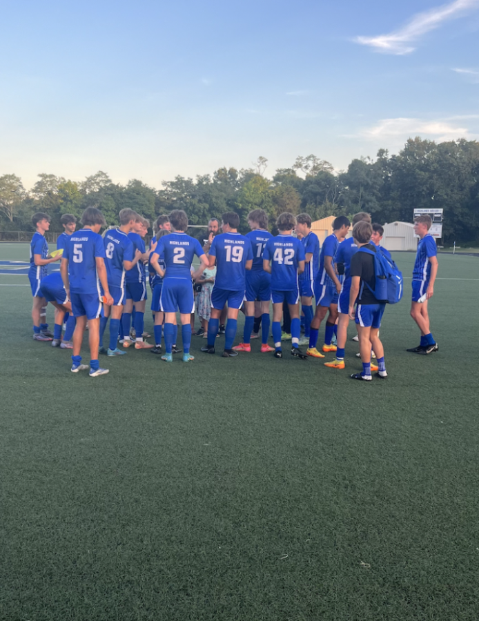 The Boys Varsity Soccer team huddles up after their win vs. Kentucky Country Day.