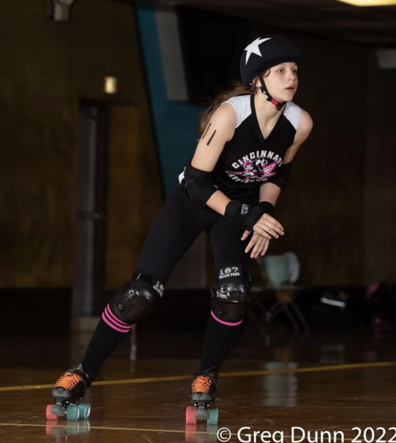 Lead jammer Abigail Hudson takes her lap after getting through the pack.