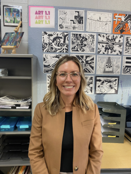 Art Teacher Stephanie Beiting smiling for the camera before class begins.