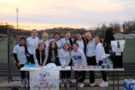 A group of girls get together to help with running the fundraiser.