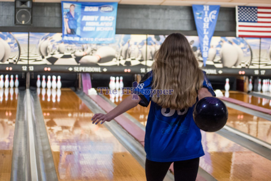 Junior Hailey Jones eyes the pins as she sends her ball into motion. 