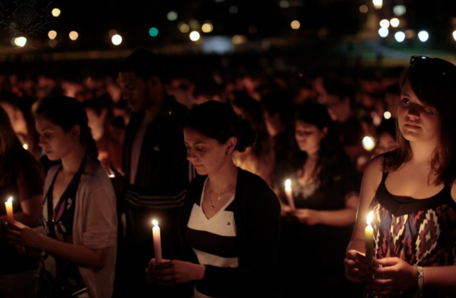 Citizens come together to mourn the loss of those who passed at the Virginia Tech shooting.