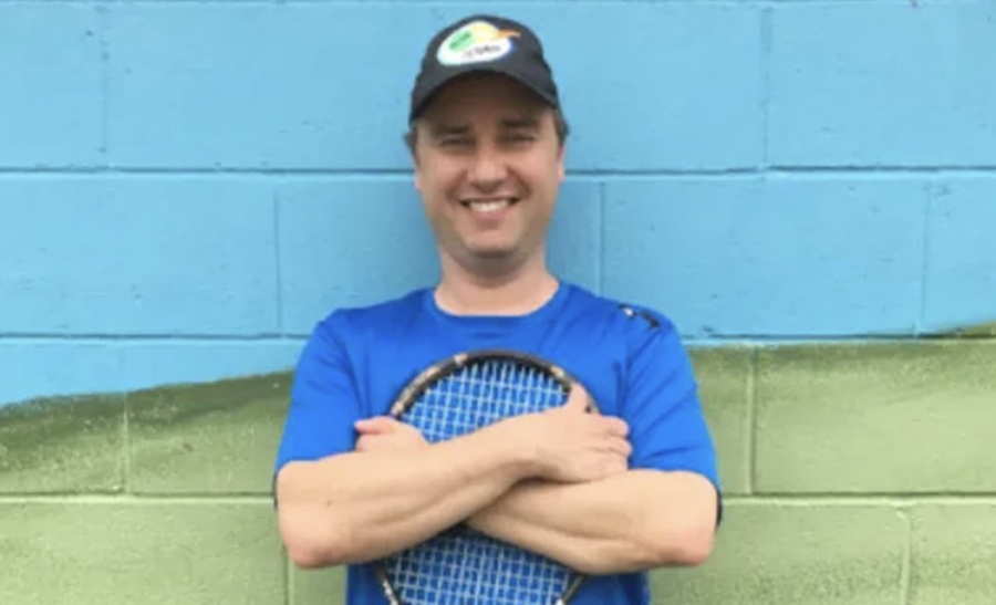 John Kolenich holds his racquet proudly. (picture provided by Twitter)