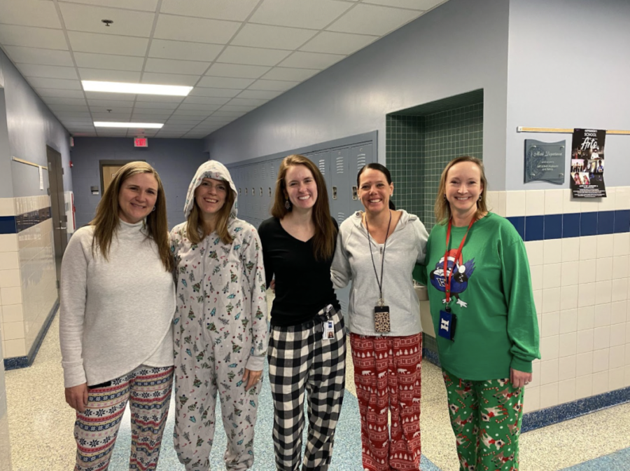 The counseling department poses with their Christmas PJs. 
