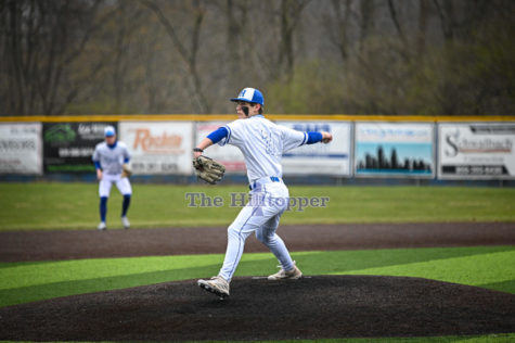 Sophomore Jake Robinson pitches in the game vs. Conner.