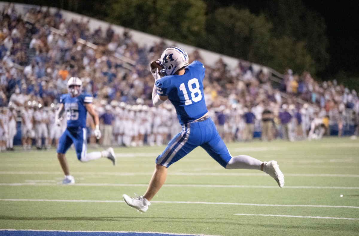 Junior Tommy Ferring catches the ball for the wide-open touchdown.