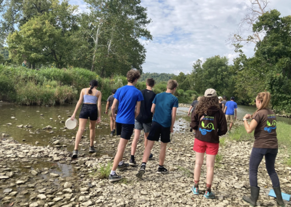 AP Chemistry and Environmental students walking the river, looking for Macro-ionvertabrate
