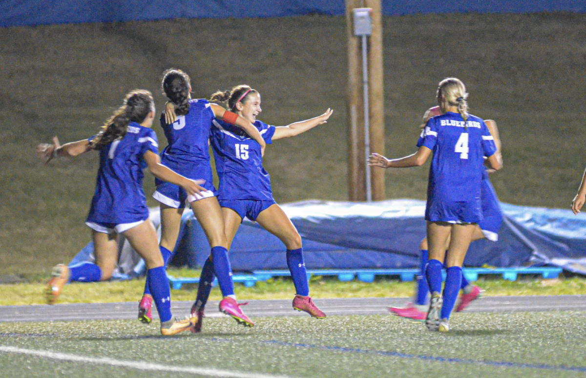 Sophomore Franny Smith and teammates celebrate after scoring.