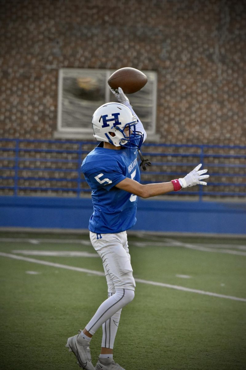 During+the+warm-ups+for+the+teams+final+match+of+the+season%2C+Freshman+John+Feldbruegge+%285%29+passes+the+ball+back+after+receiving+the+punt.