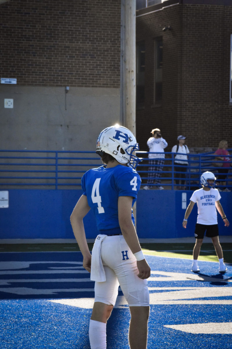 Freshman Cale Harris (4) warms up as quarterback for the first home game for the freshman season versus the Dixie Heights Colonels.