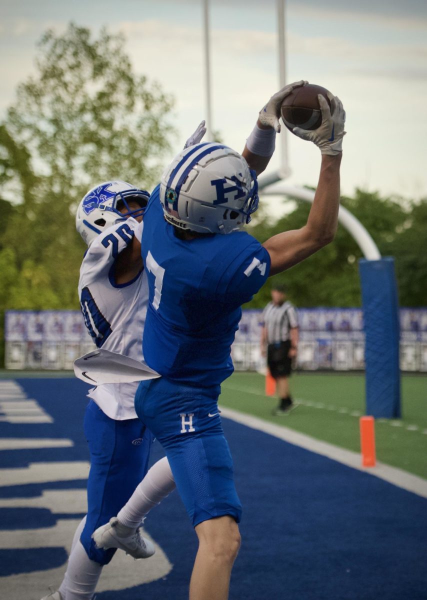 Freshman Chase Jacob (7)  scores another touchdown against the Simon Kenton Pioneers after completing an incredible pass from freshman quarterback Cale Harris. 