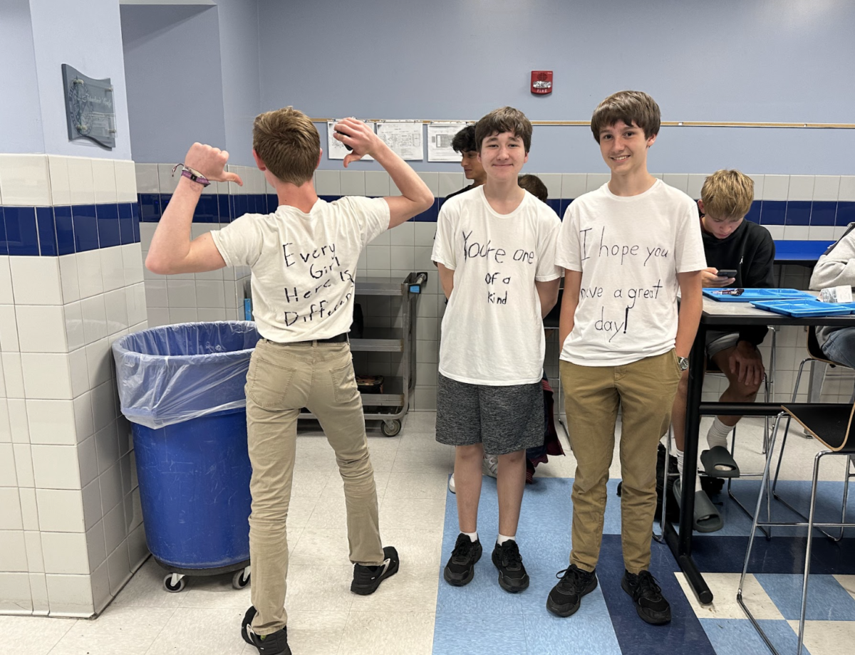 Sophomores Rafe Pinkson, Carson Shulte, and Harrison Schultz wear their white lie t-shirts. Shulte said,I thought spirit. week was a great idea and it was nice expressing my thoughts.