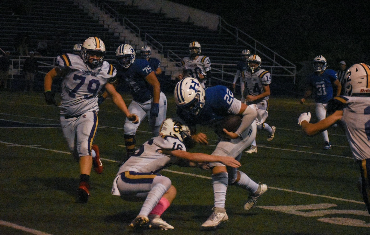 After Number 22, Tayden Lorenzen, trucks a Campbell County player, he states, “That boy’s too little to tackle me!”
