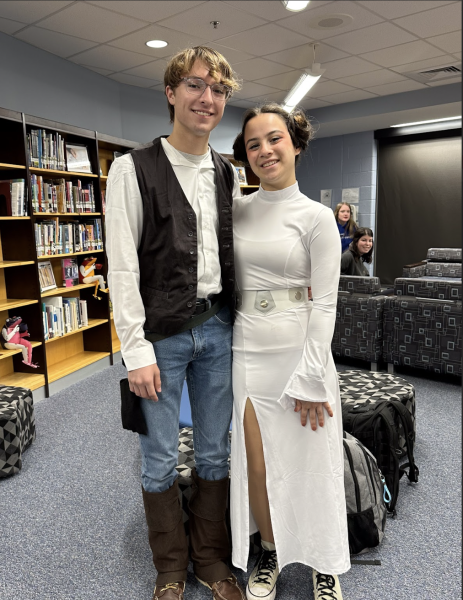 Junior Sam Gillen and Cal Lacourt dress up has Han Solo and Princess Leia from Star Wars.