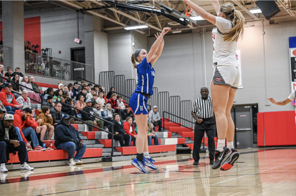 8th grader Maren Orme goes in for the shot against the Dixie Heights Colonels.