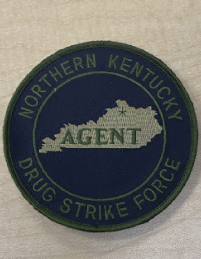 Officer Zac Rohlfer’s Kentucky Drug Strike Force badge from his time serving for them.