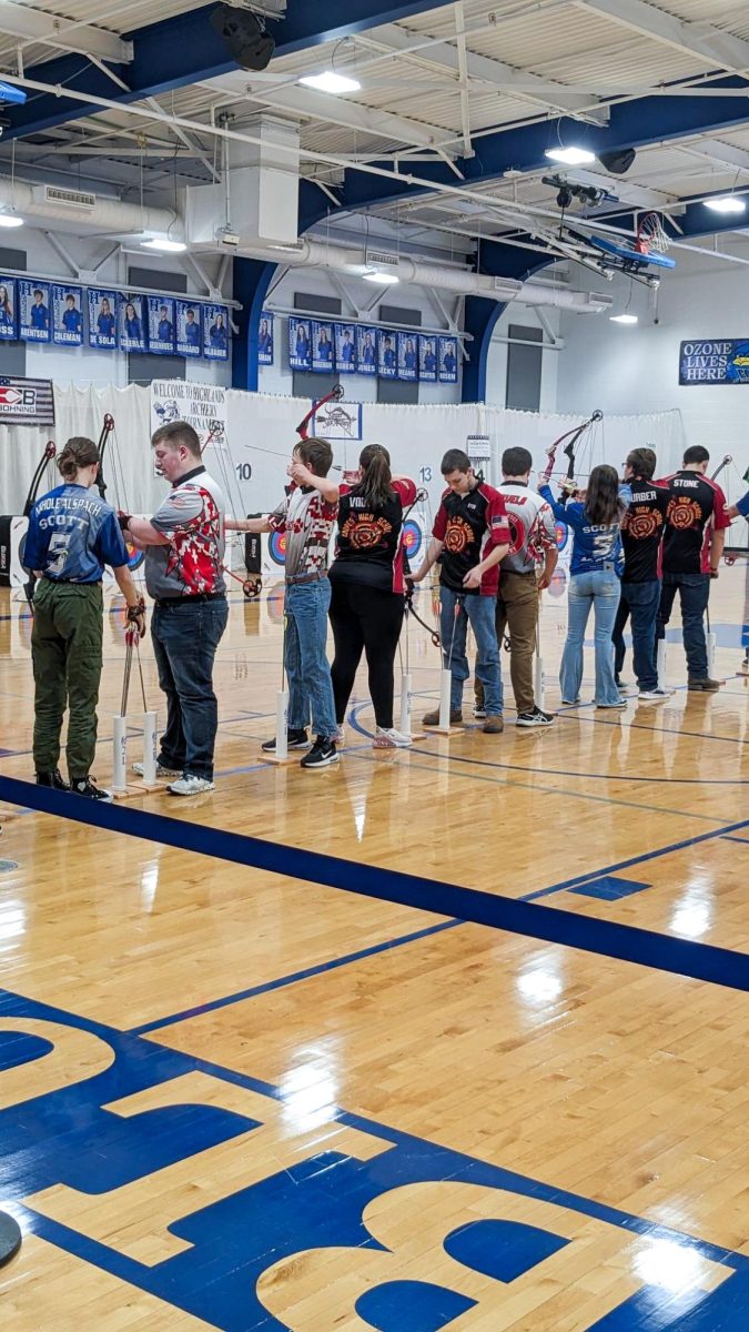 The teams prepare to let loose their arrows, all praying for a bullseye.