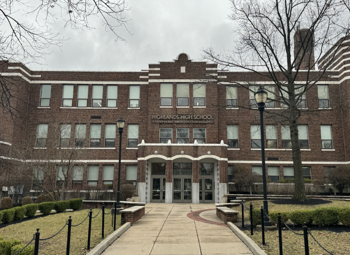 The front of Highlands High School on a cloudy day 