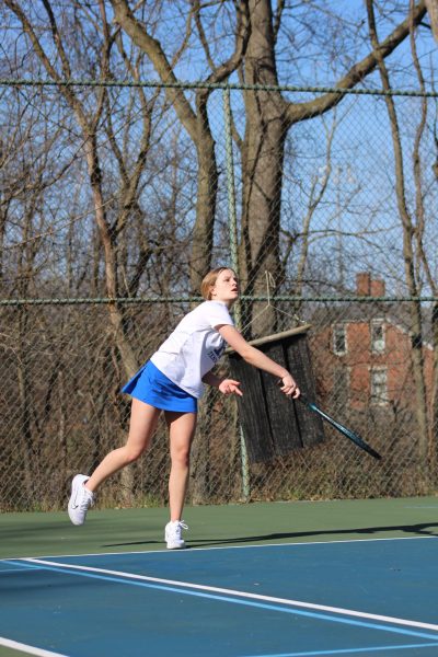 Junior Audrey Arentsen serves the ball over to Dixies side.