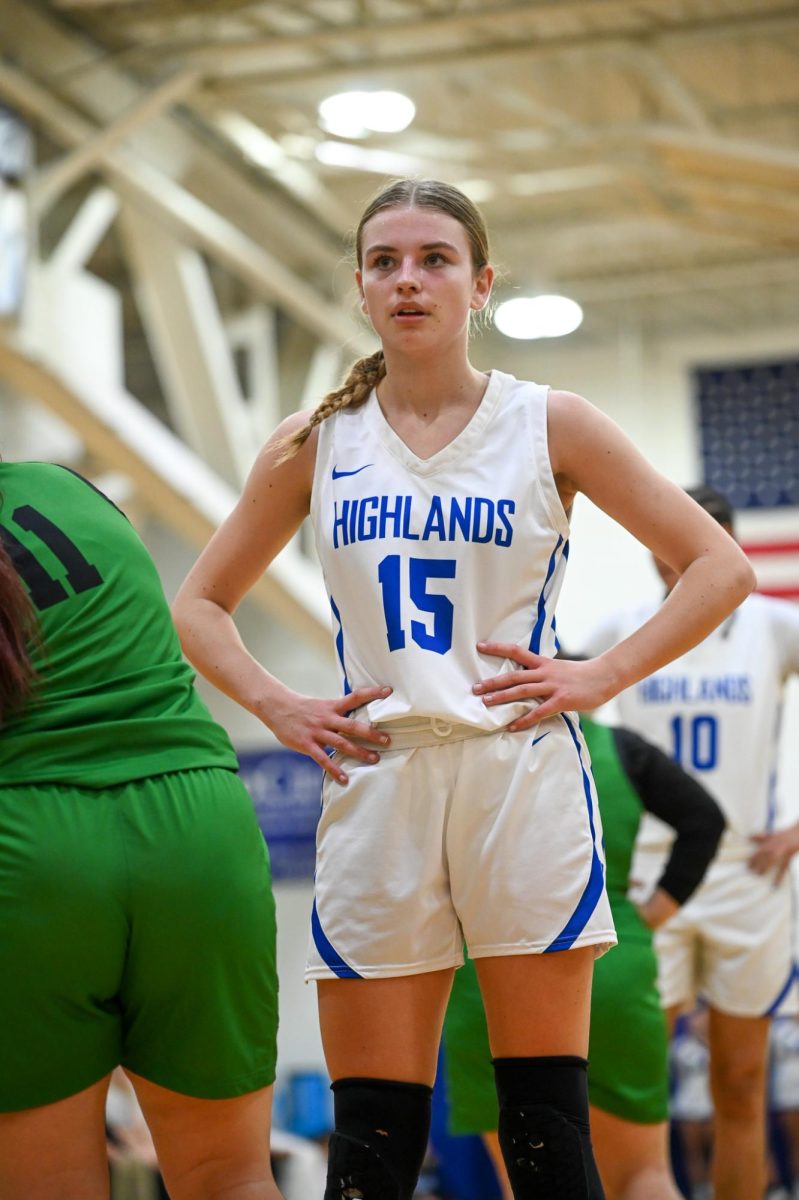 Katie Bucher (11) remains focused as the next play is about to start. “Looking down the road at what we can accomplish in the region, keeps me motivated and pushes me to do my best,” Bucher said.