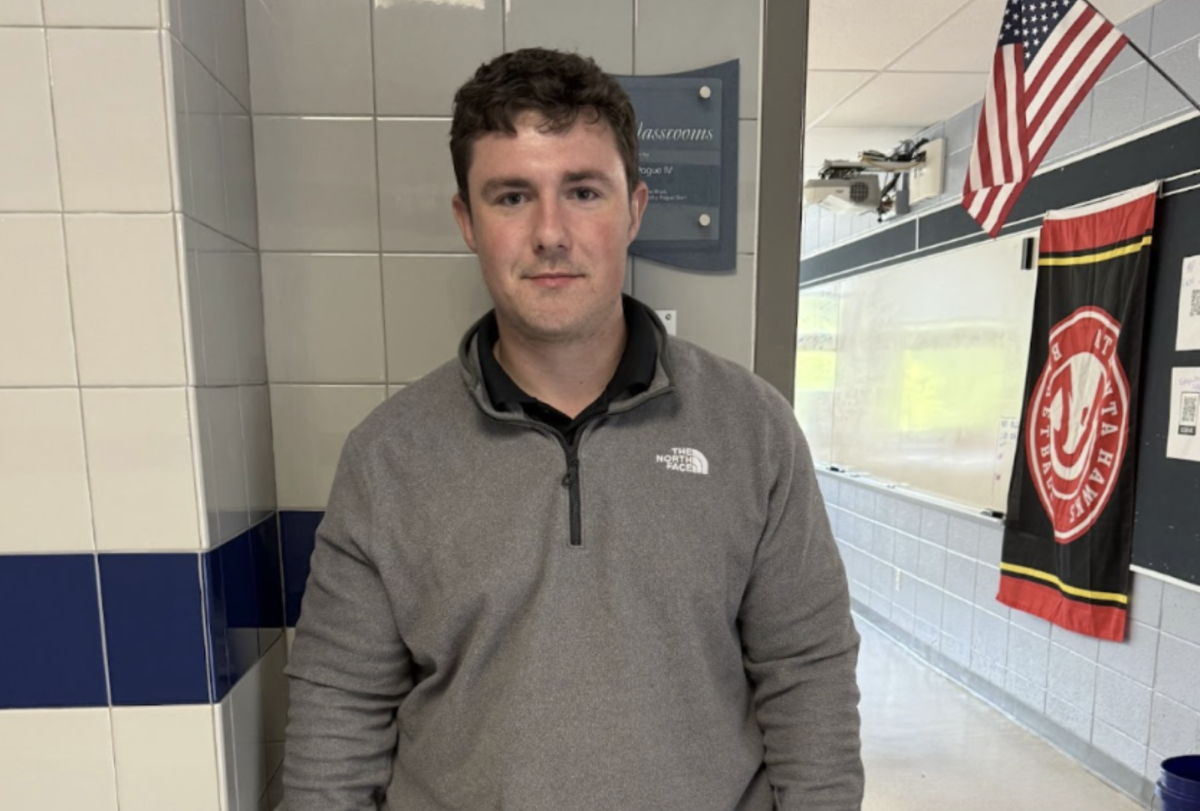 New teacher Aaron Sary pictured in front of his new classroom.