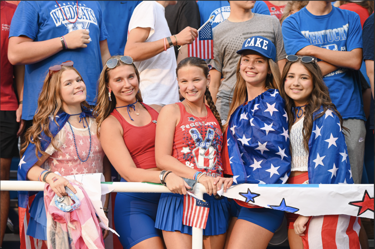 Seniors Madison Barlow, Avery Barber, Franny Smith, Katie Bucher, and Hayden Gessner stand together for a photo in the ozone.