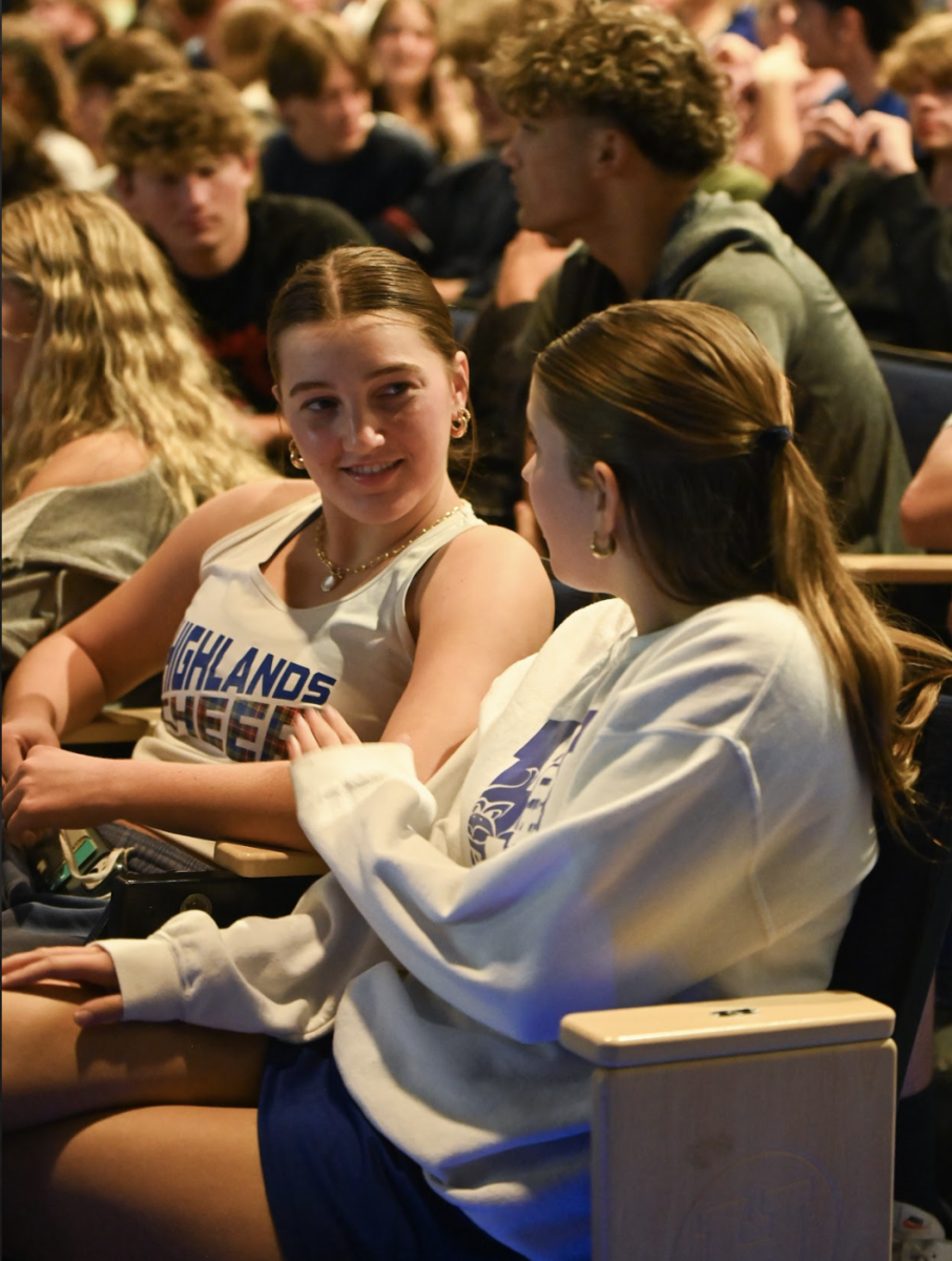 Kendall Shields (11) and Lylah Doerr (11) discuss what they are grateful for.