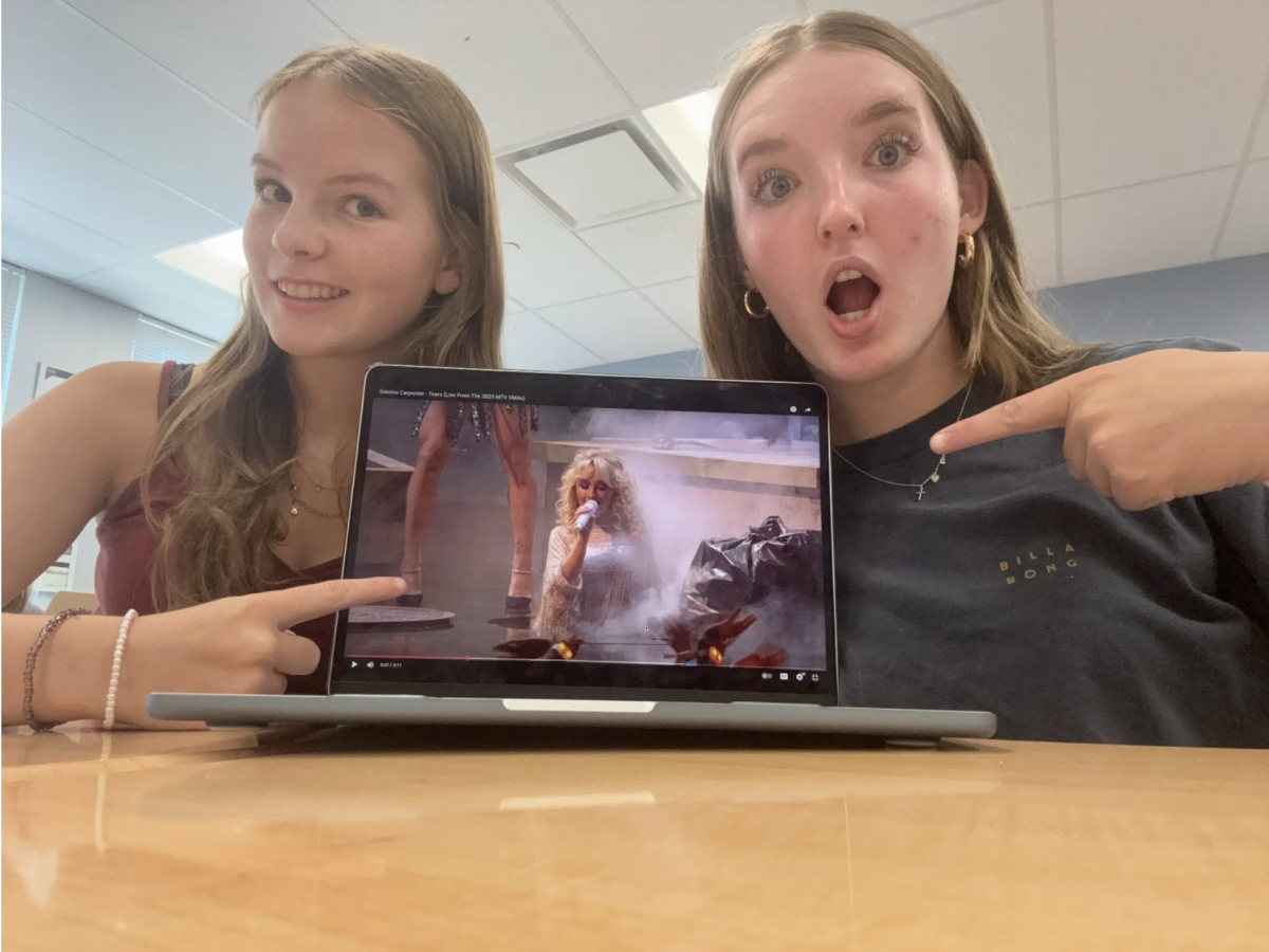 Stella Taylor (10) and Natalie Abdon (10) watch Sabrina Carpenter’s 2025 VMA performance. 