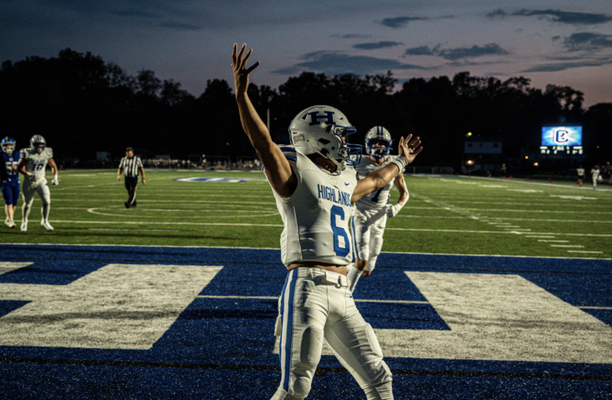 Rio Litmer (11) celebrates after scoring a touchdown in last year’s rivalry game on Aug. 30, 2024.