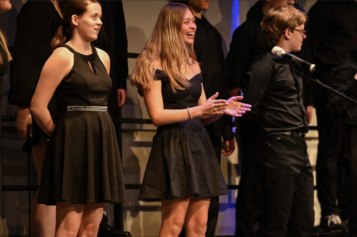 Brielle Stanford (9), Vera Knight (9), and Wyatt Anderson (10) wrap up the Bel Canto performance. "My favorite part was hearing everyone combined." Knight said.