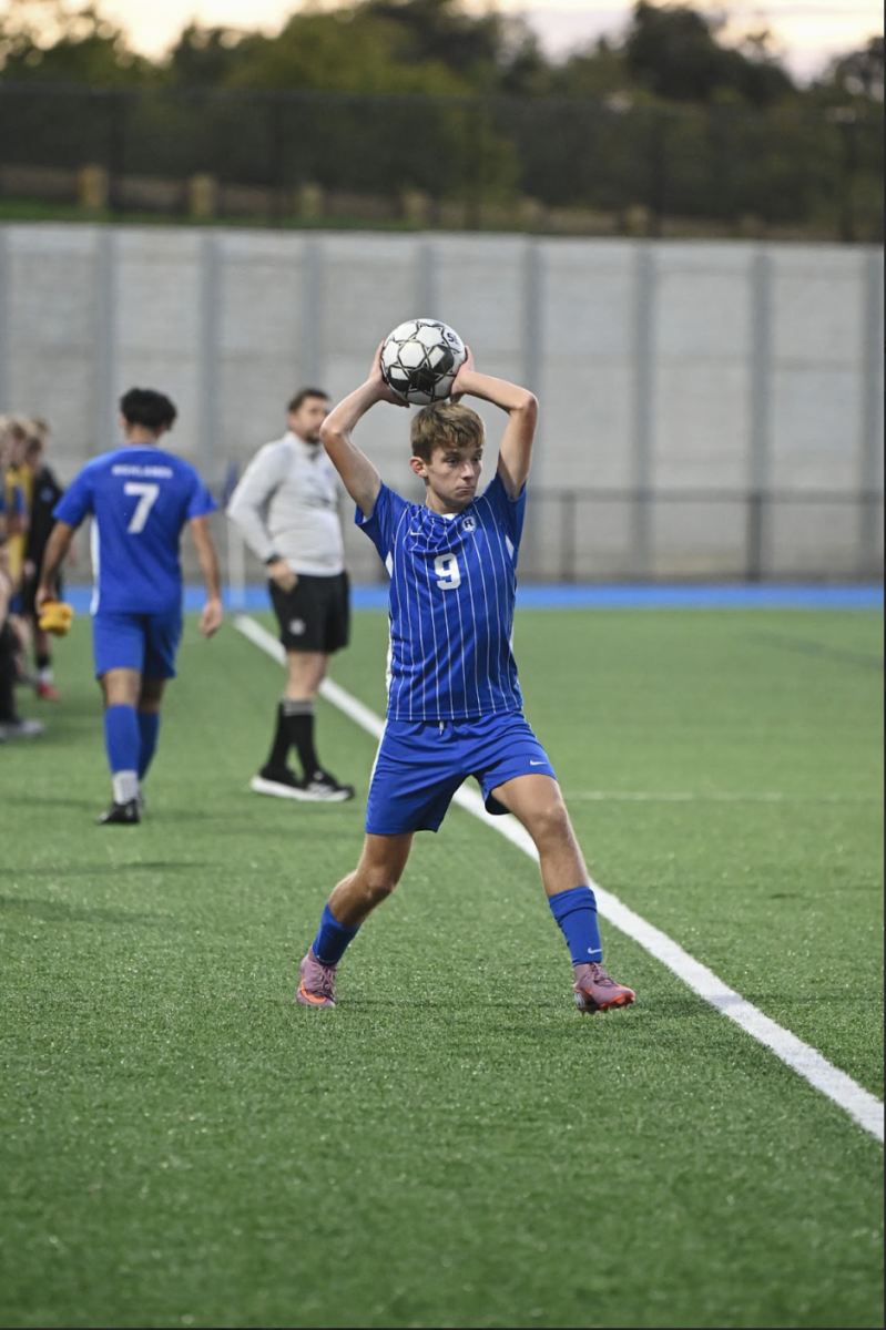 Ethan Lang (10) throws the ball into the field.