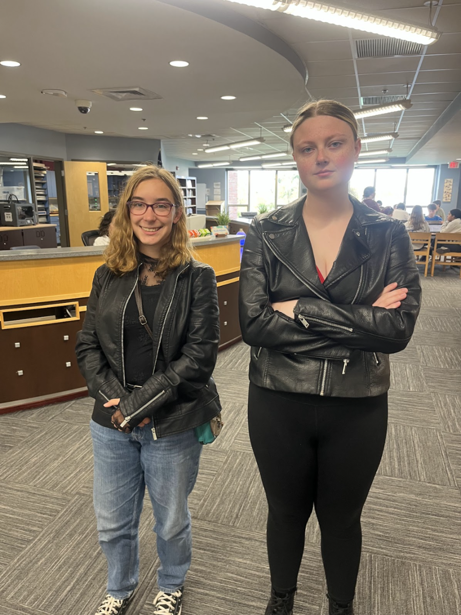 Eva Weinel (12) and Addy Eifert (12) embrace their inner bikers with matching leather jackets during Surfers vs. Bikers day.