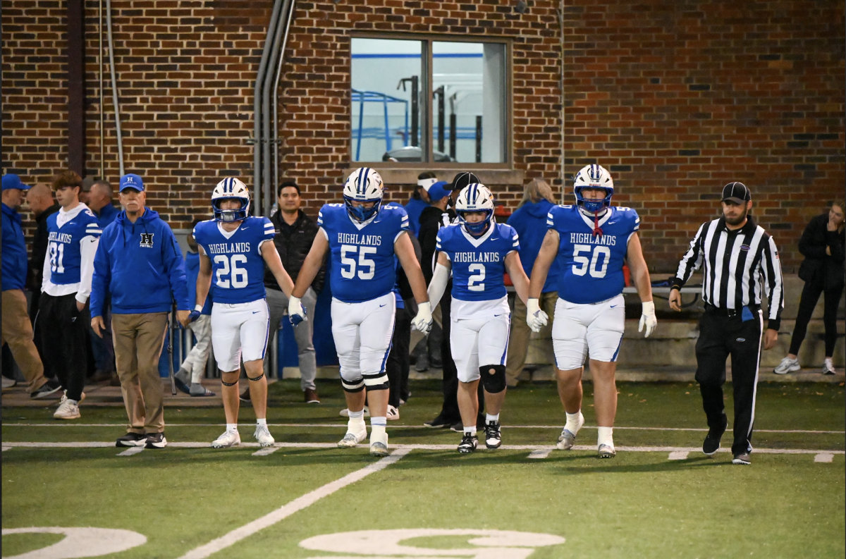 The captains for the Highlands Football team walk on the field for the Nov. 14 game vs. Ashland. 
